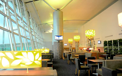 Rose Business Lounge seating area with decorative lamps, Tan Son Nhat International Airport Terminal 2.