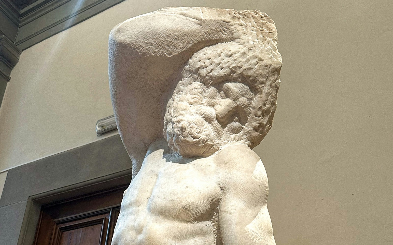 Bearded Slave sculpture at Accademia Art Gallery, Florence, Italy.