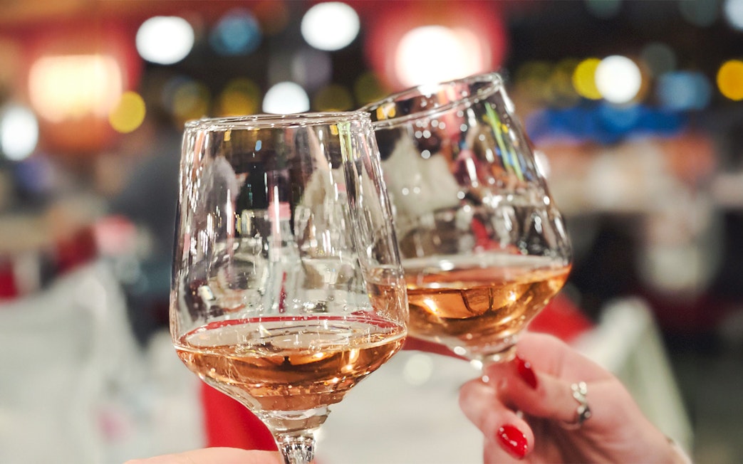 Toasting glasses of champagne on a Budapest cruise.