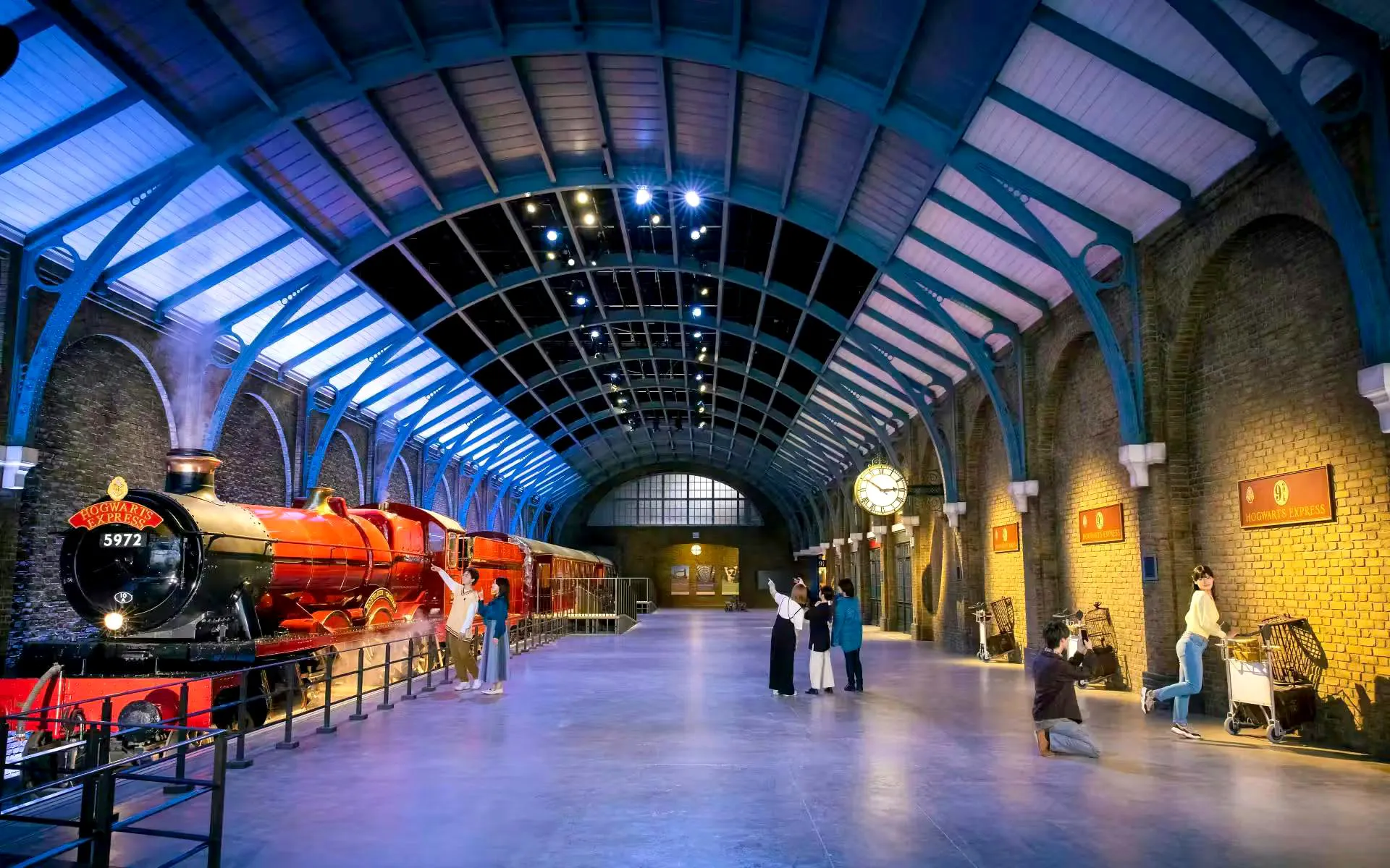 Hogwarts Express at Warner Bros. Studio Tour Tokyo, visitors taking photos.