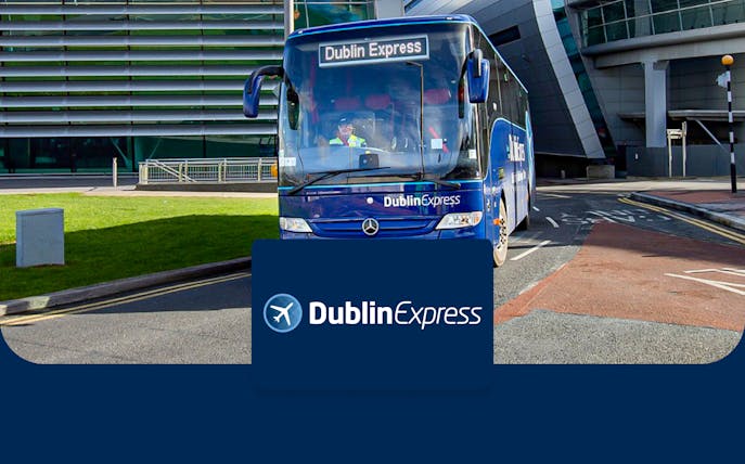 Dublin Express bus at Dublin Airport terminal.