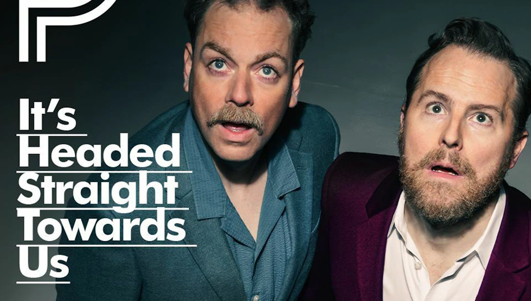Two men looking surprised with the text "It's Headed Straight Towards Us" in bold letters.