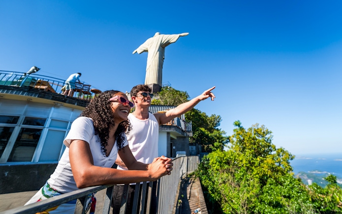 Guests enjoying the view at Christ the Redeemer statue, Rio de Janeiro.