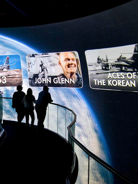 Visitors viewing space and aviation displays at the Heroes and Legends Exhibit, Kennedy Space Center.
