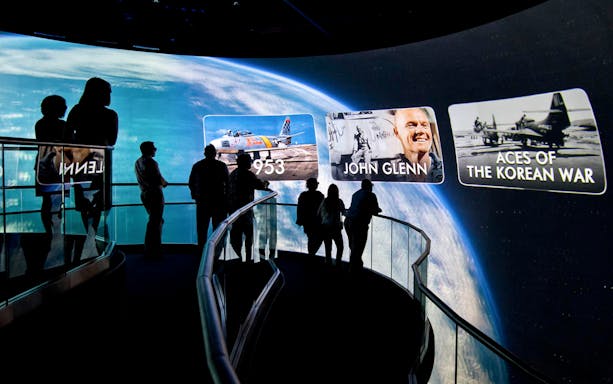 Visitors viewing space and aviation displays at the Heroes and Legends Exhibit, Kennedy Space Center.