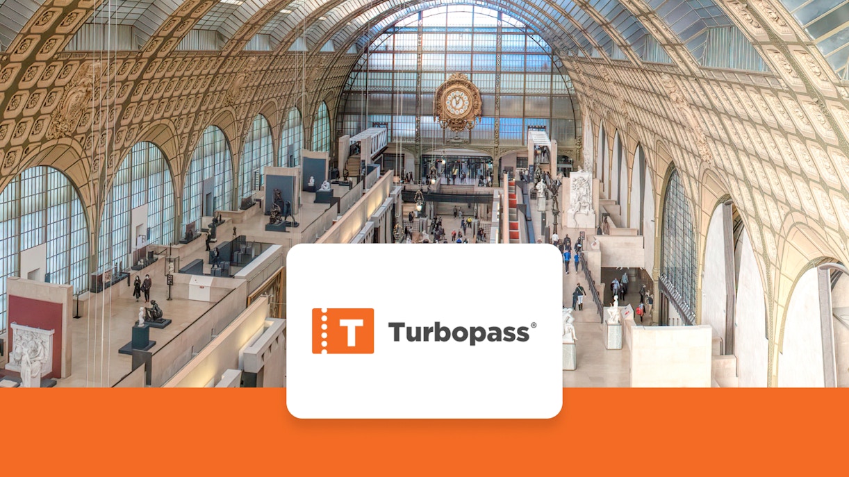 Interior view of Musée d'Orsay in Paris, showcasing art exhibits and architecture.