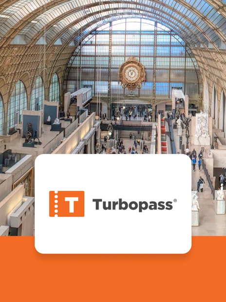 Interior view of Musée d'Orsay in Paris, showcasing art exhibits and architecture.