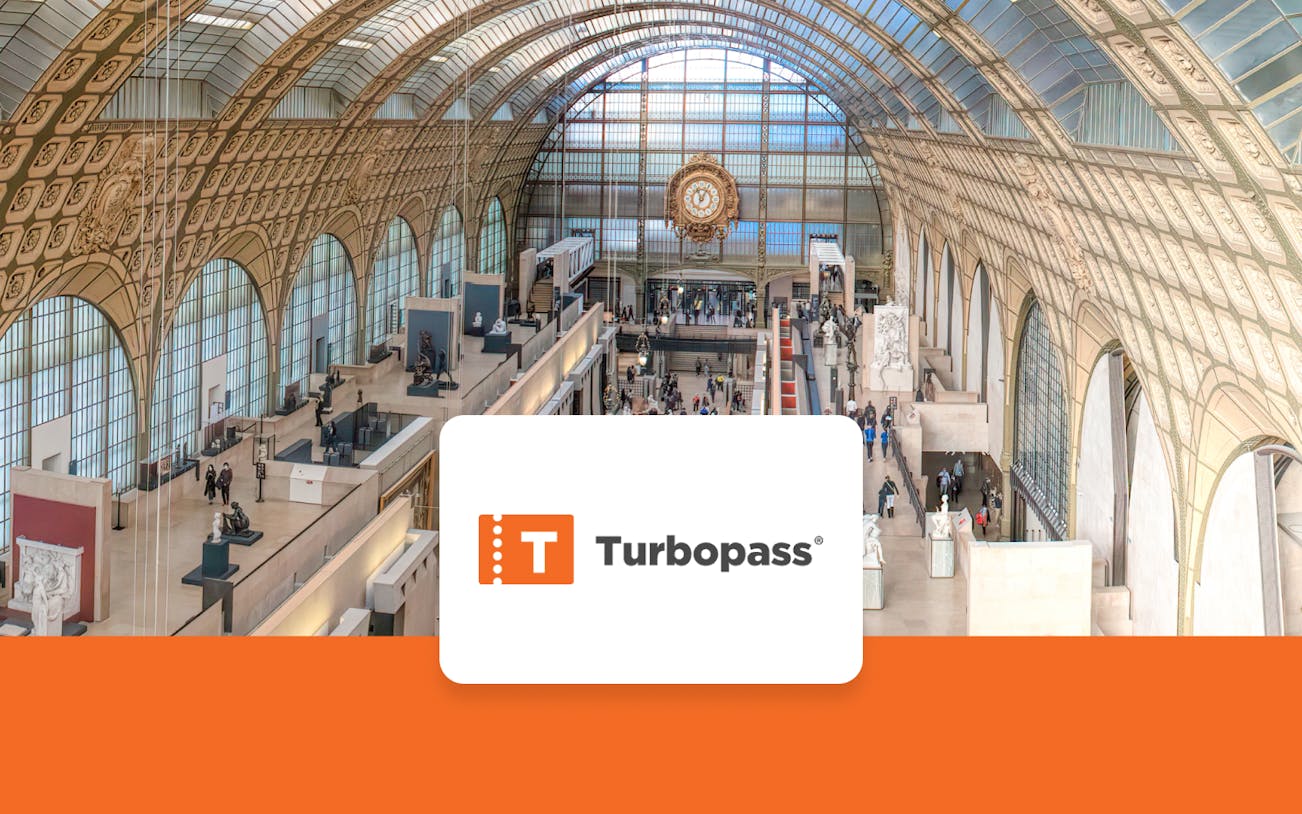 Interior view of Musée d'Orsay in Paris, showcasing art exhibits and architecture.