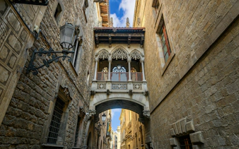 El Pont del Bisbe, Gothic bridge connecting buildings in Barcelona's Gothic Quarter.
