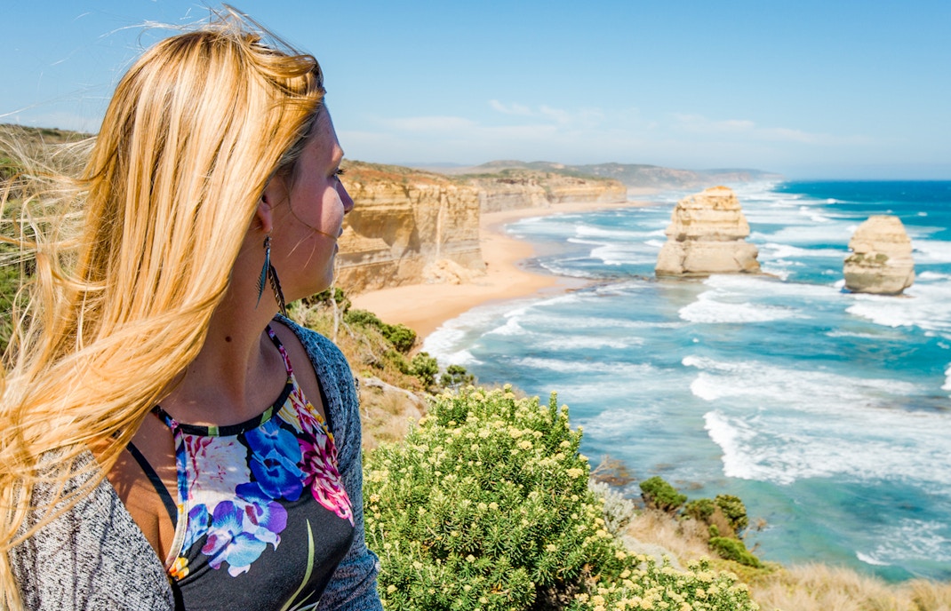 Lady looking out at Shipwreck Coast, Great Ocean Road Ecotour