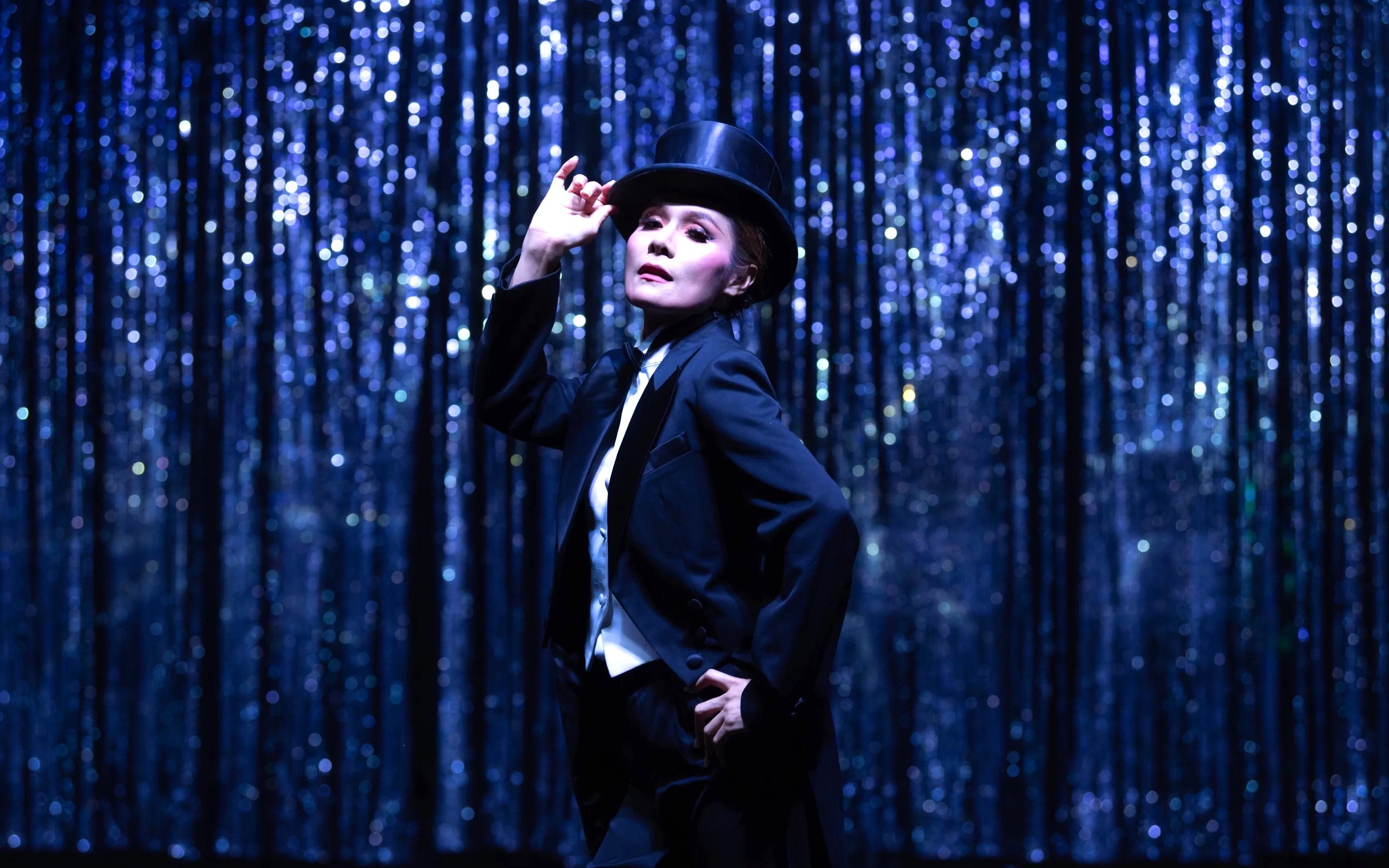 Performer in top hat at Calypso Cabaret show, Bangkok.
