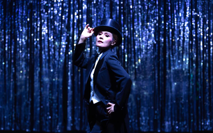 Performer in top hat at Calypso Cabaret show, Bangkok.