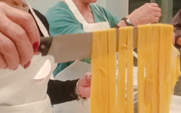 Fettuccine and traditional wine cookies Cooking Class by the Sea in Rome