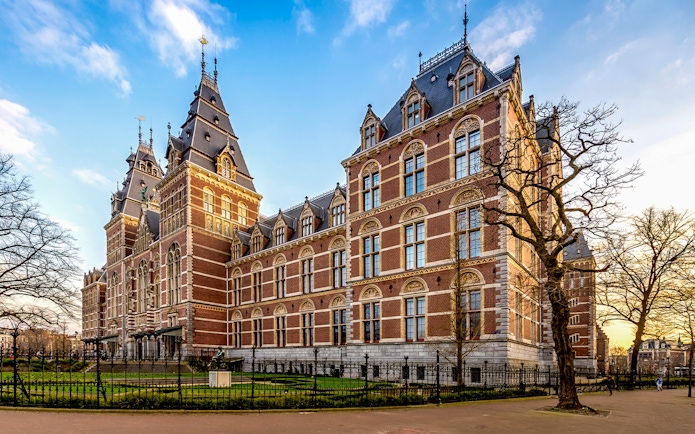 Rijksmuseum exterior in Amsterdam during a small group guided tour.