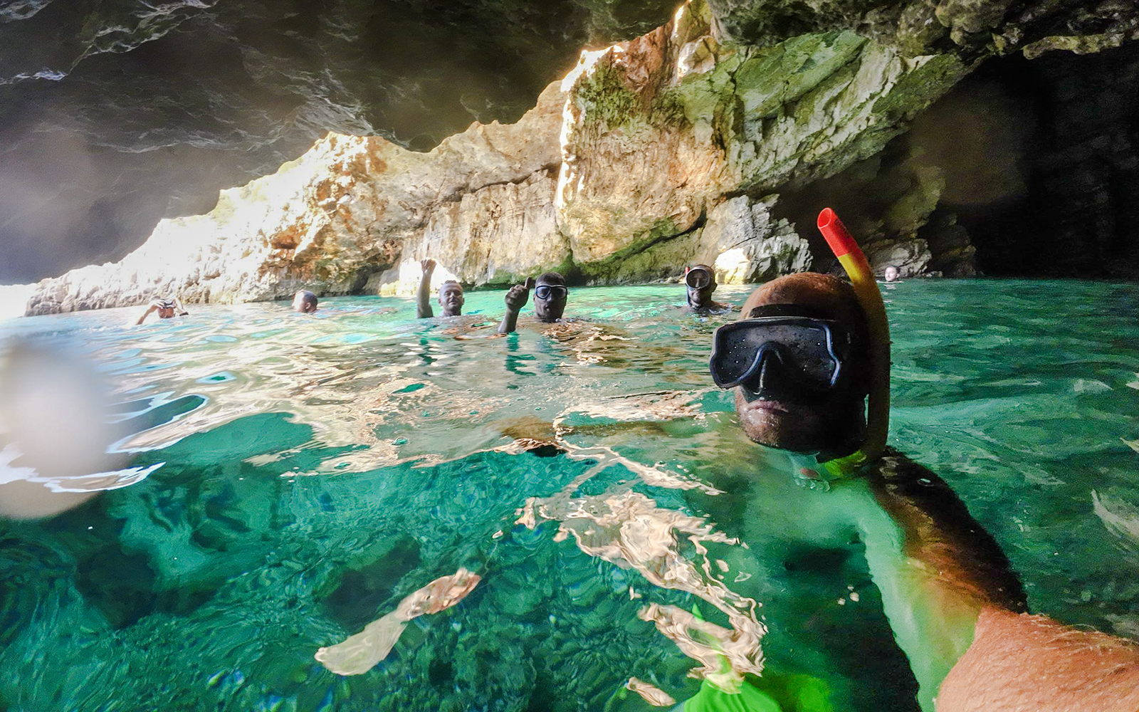 Snorkelers exploring Blue Caves in Albania.