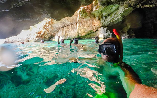 Snorkelers exploring Blue Caves in Albania.