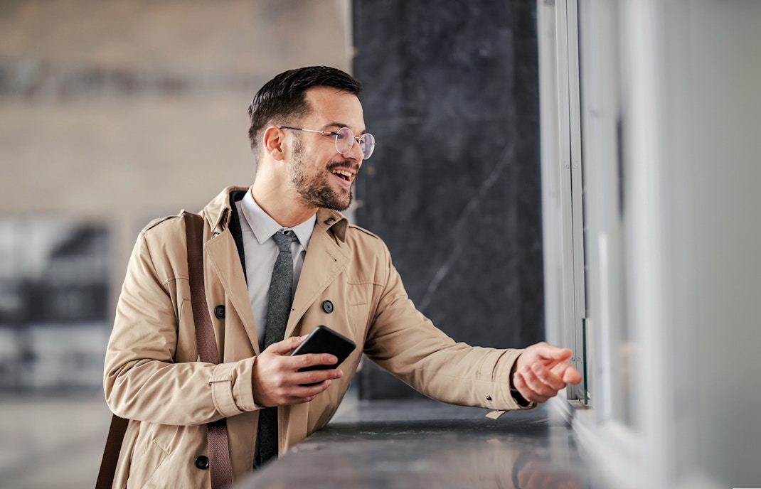 Man at ticket counter