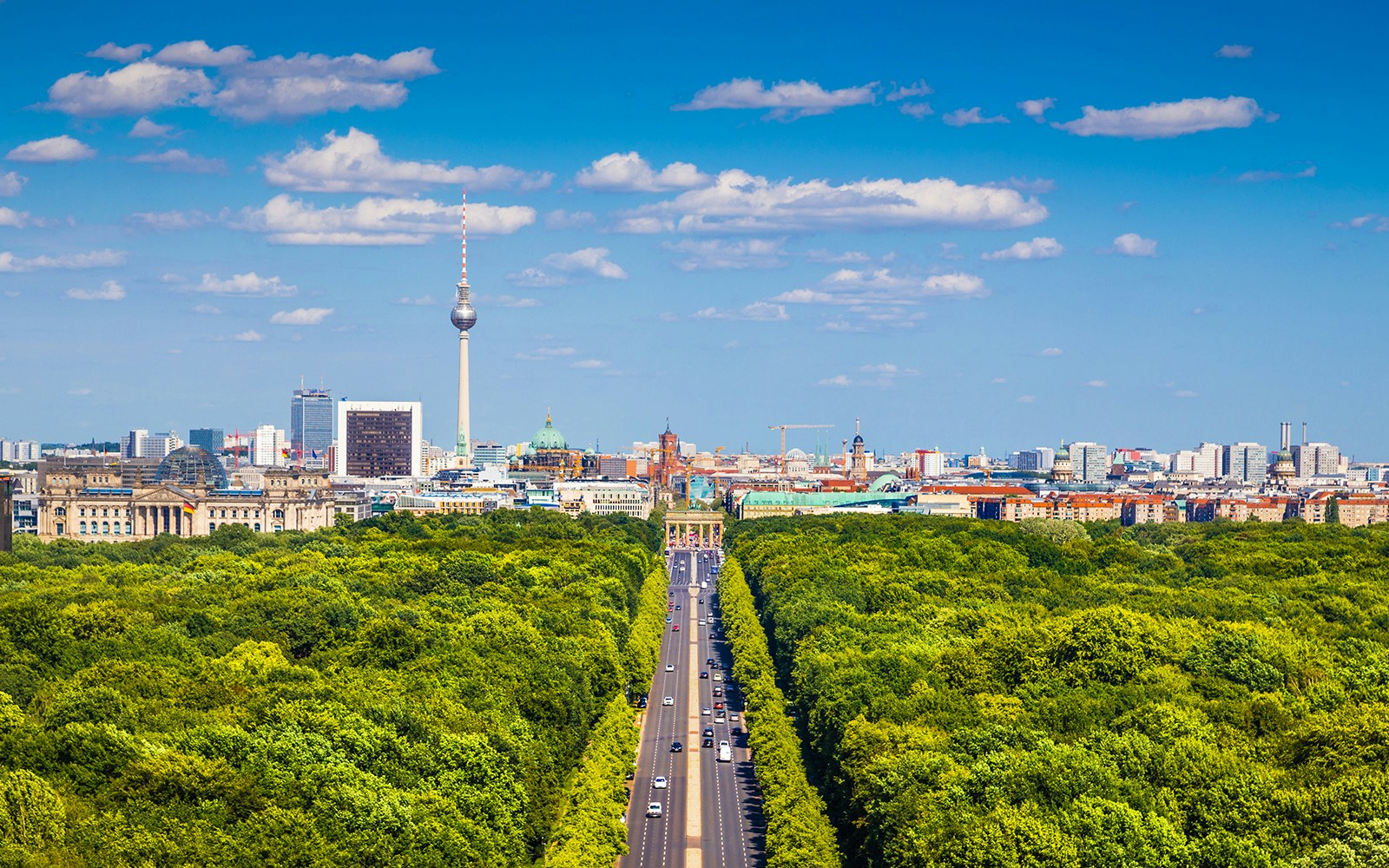 Tiergarten park in Berlin with the Berlin skyline and TV Tower in the background.
