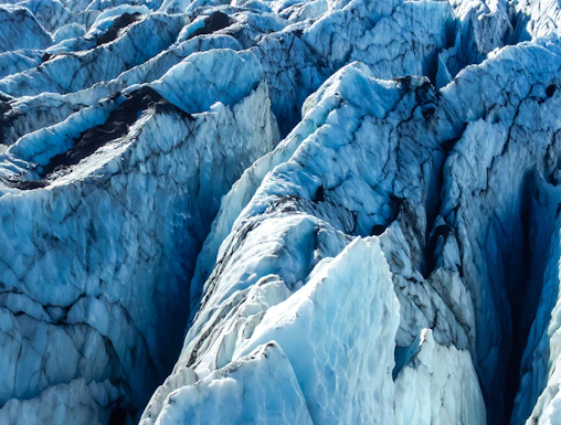 Vatnajokull glacier's icy crevasses and rugged terrain in Iceland.