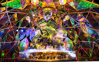 Nara Kingyo Museum exhibit with colorful geometric mirrors and vibrant fish tank.