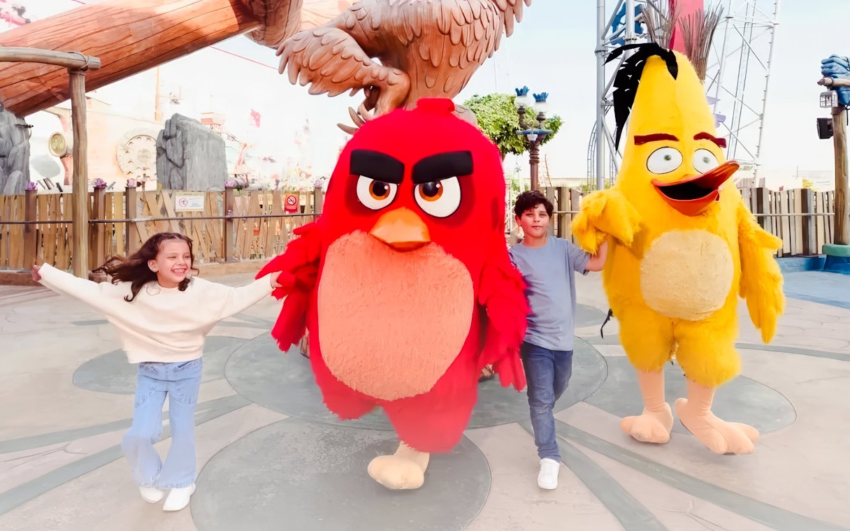 Children with Angry Birds mascots at Angry Birds World Theme Park.