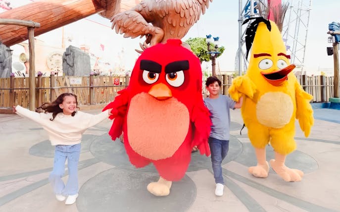 Children with Angry Birds mascots at Angry Birds World Theme Park.