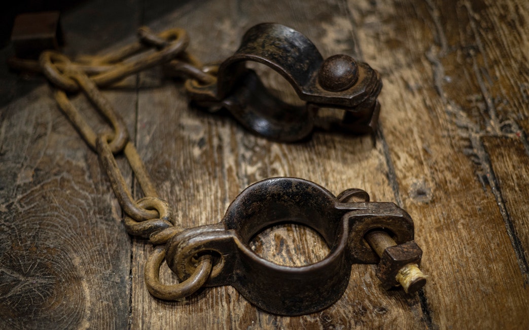 Shackles on wooden floor, Edinburgh Dungeon Tour.