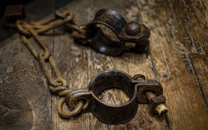 Shackles on wooden floor, Edinburgh Dungeon Tour.
