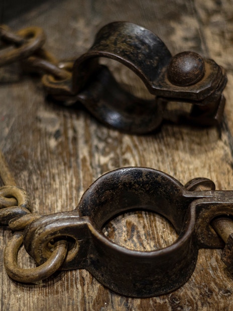 Shackles on wooden floor, Edinburgh Dungeon Tour.
