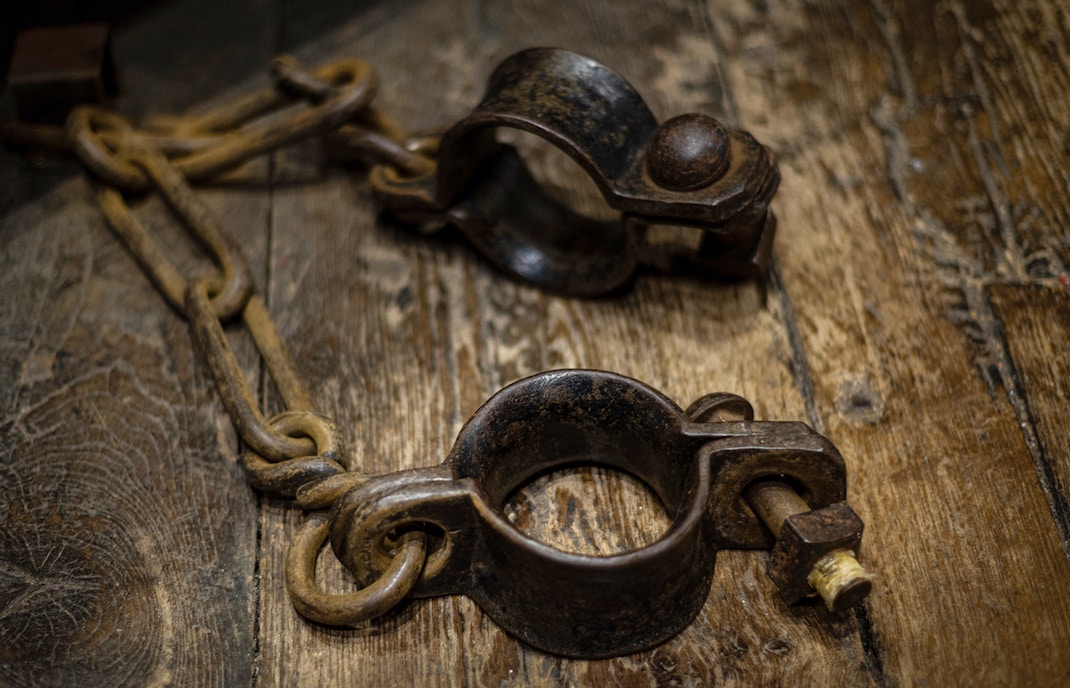 Shackles on wooden floor, Edinburgh Dungeon Tour.