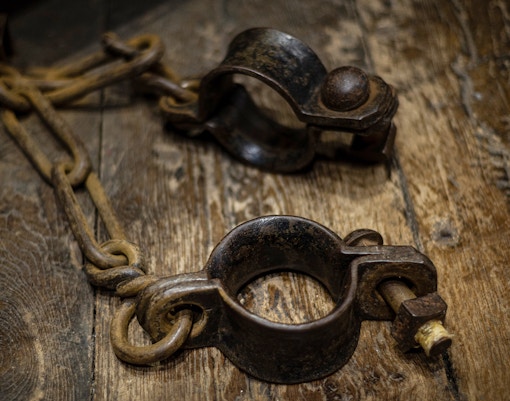 Shackles on wooden floor, Edinburgh Dungeon Tour.