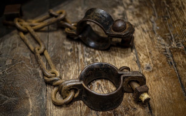 Shackles on wooden floor, Edinburgh Dungeon Tour.