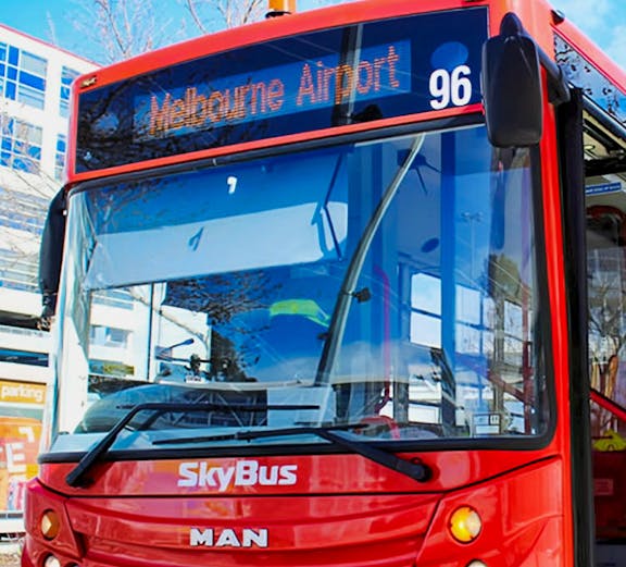SkyBus at Melbourne Airport terminal.