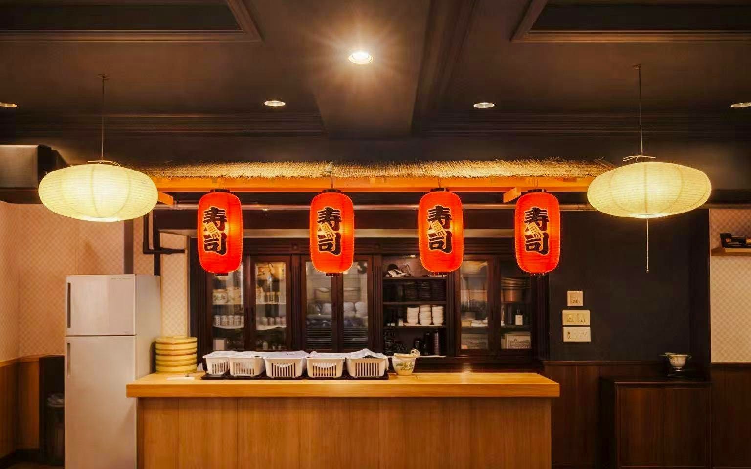 Kitchen counter with sushi lanterns at Hands-On Sushi Making Workshop in Osaka.