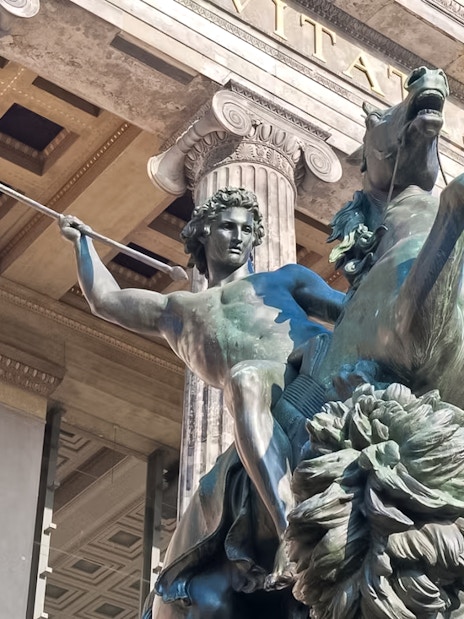 Statue of a warrior on horseback at Altes Museum entrance, Berlin.