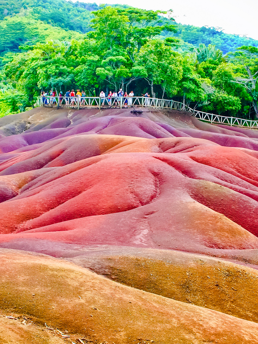 Chamarel 7 Coloured Earth Dunes with tourists on viewing platform, Mauritius.
