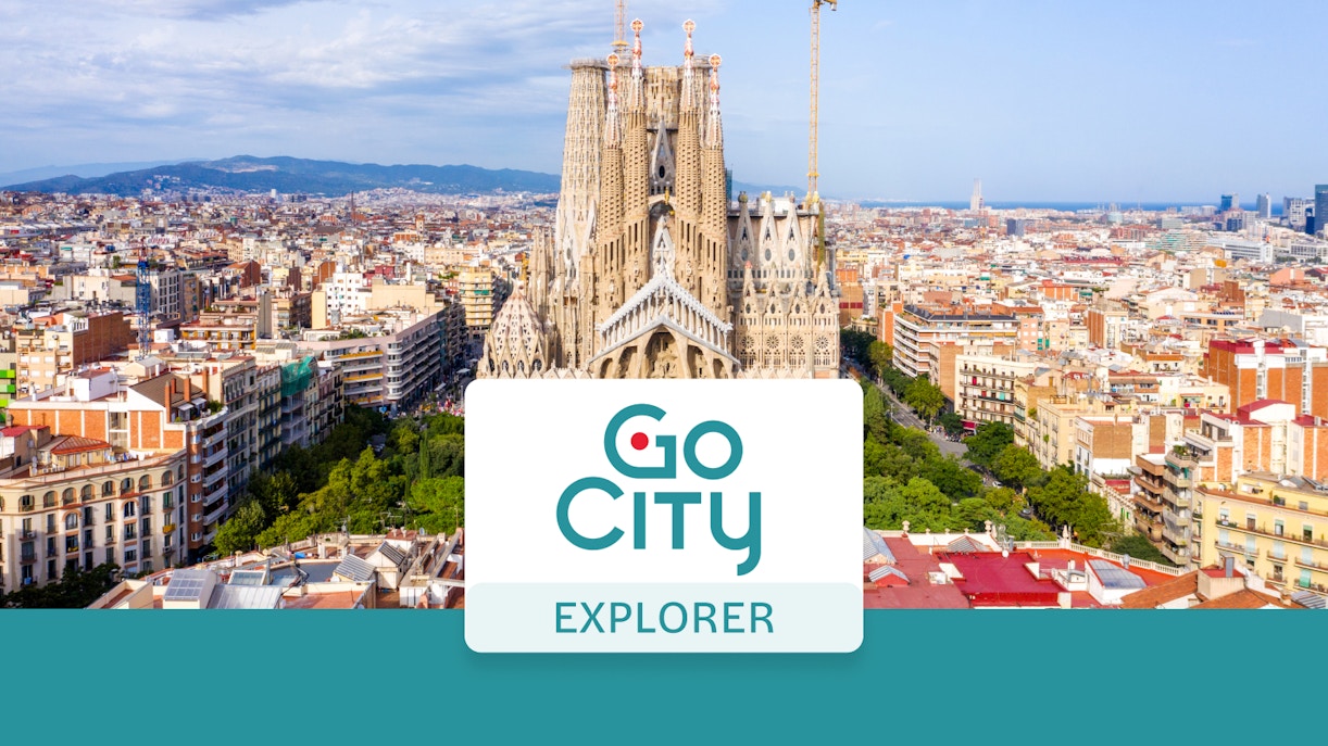 Panoramic view of Sagrada Familia and Barcelona cityscape.