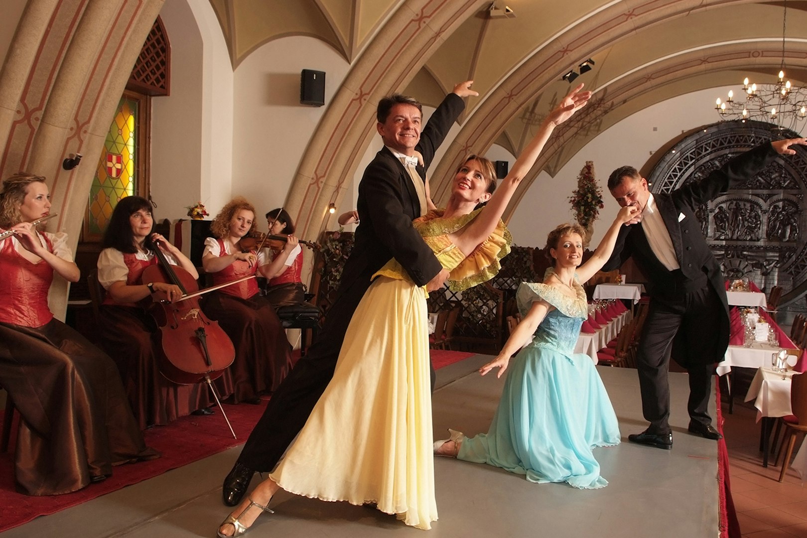 Dancers and musicians performing at an Austrian Dinner Show in Vienna.