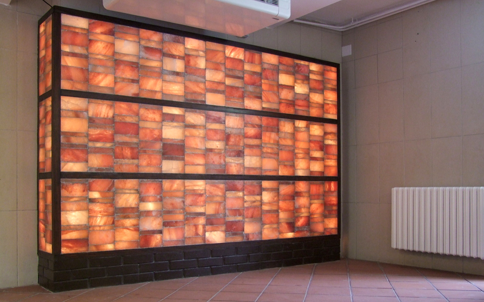 Salt therapy room with illuminated salt bricks at Lukacs Spa.