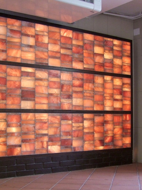 Salt therapy room with illuminated salt bricks at Lukacs Spa.