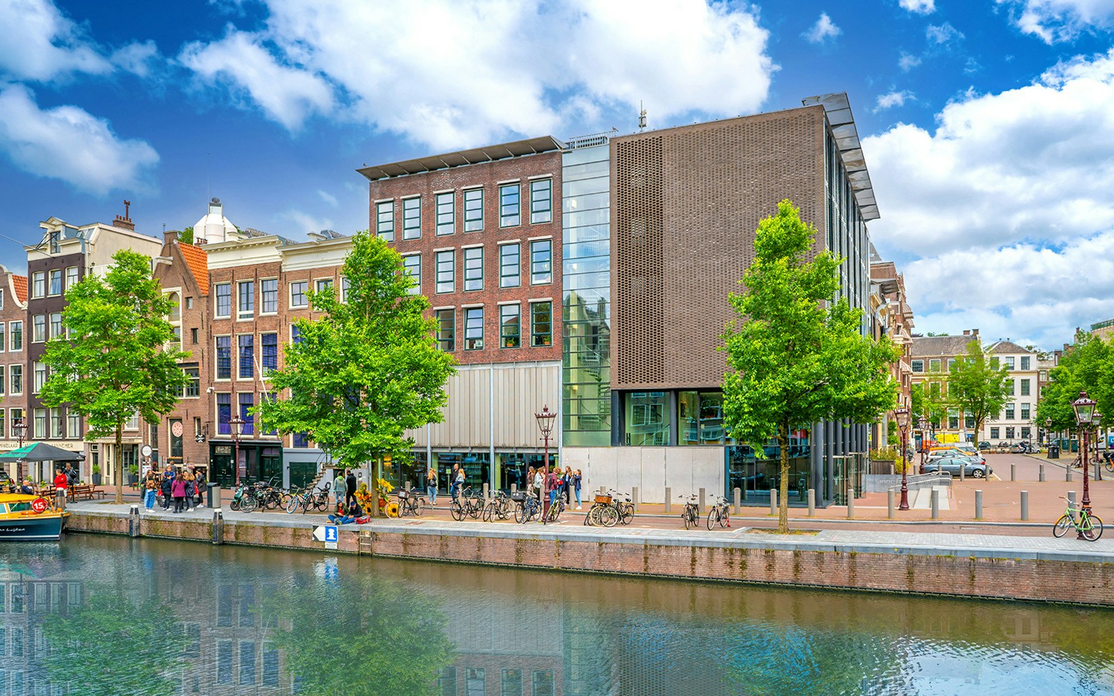 Anne Frank House exterior with canal view in Amsterdam.