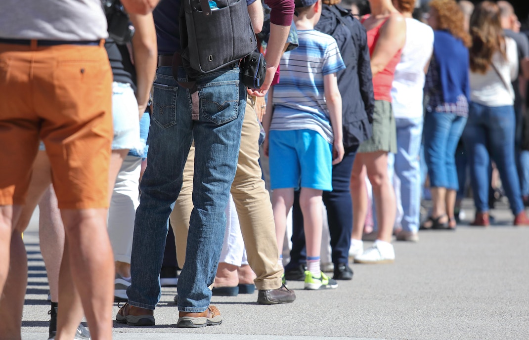 People waiting in a long line