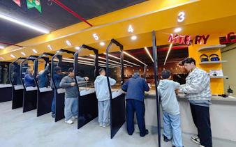 Shooting range with instructors guiding participants in Sa Pa.
