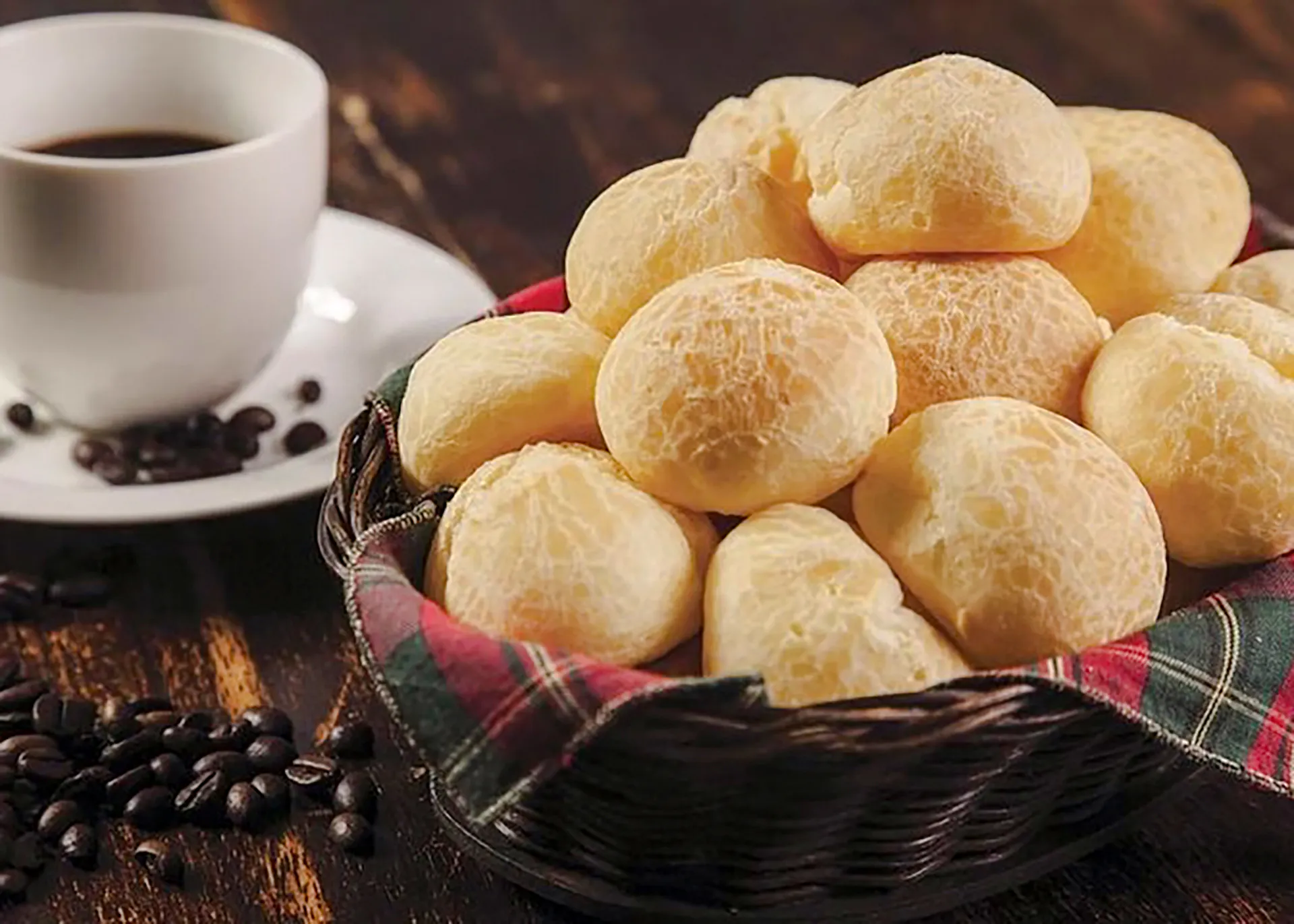 Basket of pão de queijo with coffee cup, Coffee Valley, Rio de Janeiro tour.