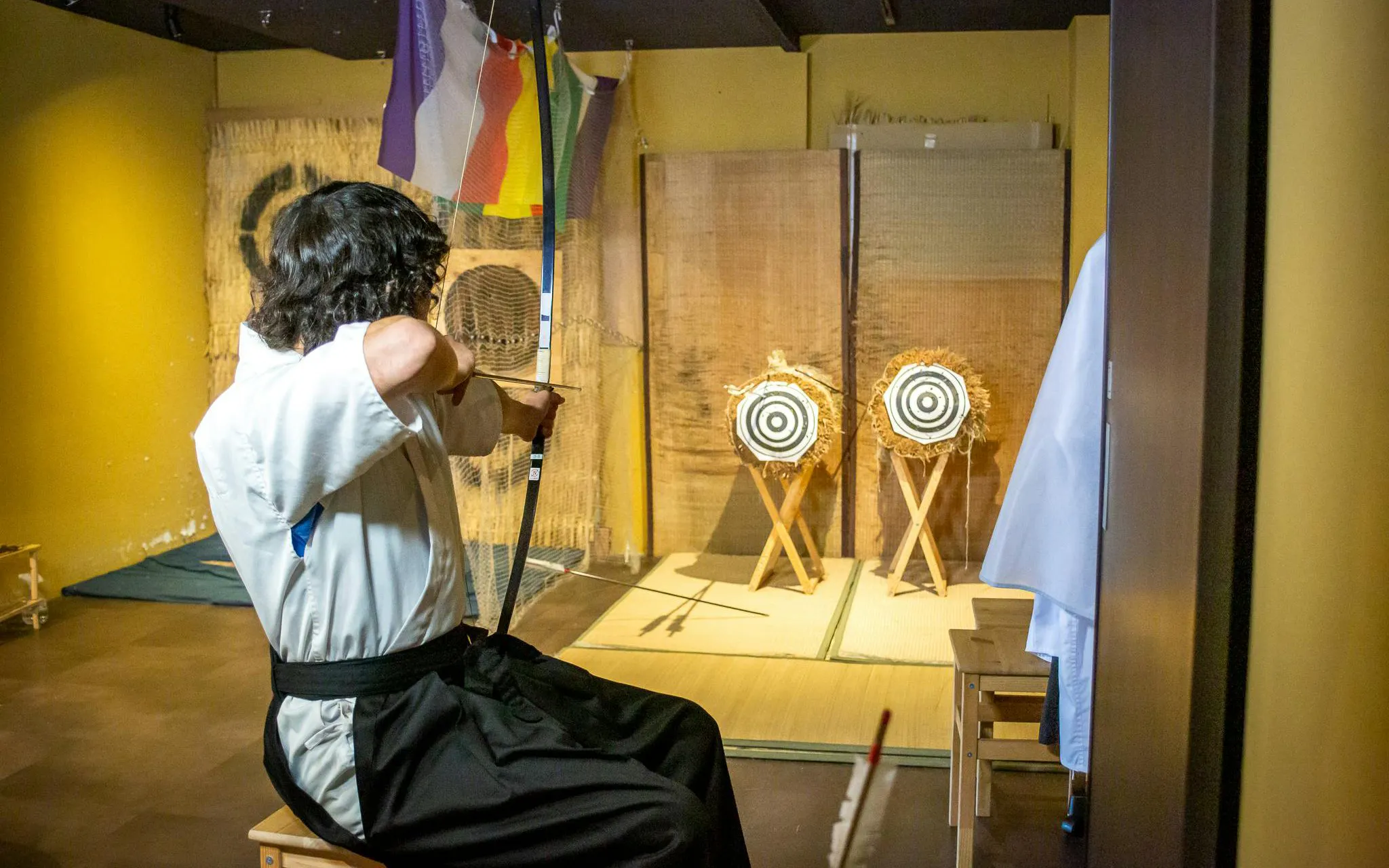Man practicing archery at 20-Arrow Japanese Archery Experience in Kyoto.