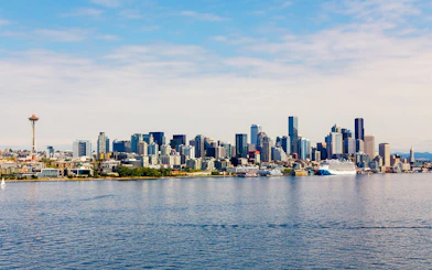 Seattle skyline with Space Needle viewed from a cruise on the water.