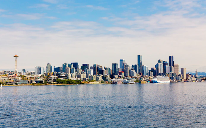 Seattle skyline with Space Needle viewed from a cruise on the water.