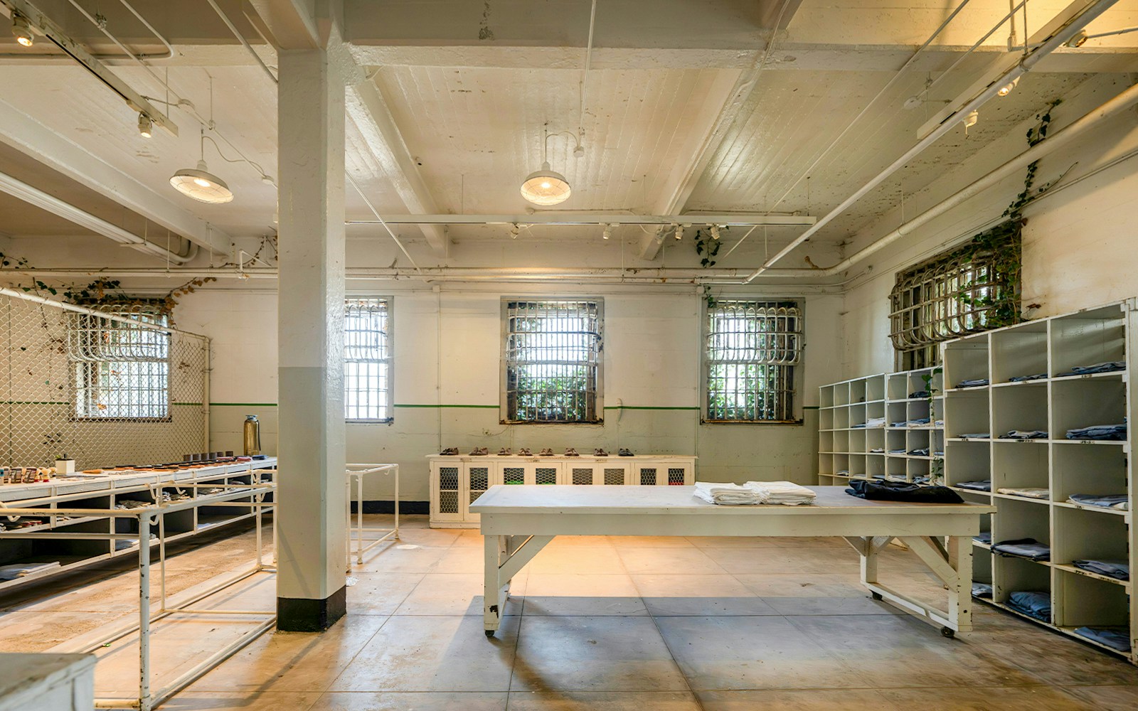 Alcatraz Prison cell interior with barred windows on Alcatraz Island, San Francisco, California.