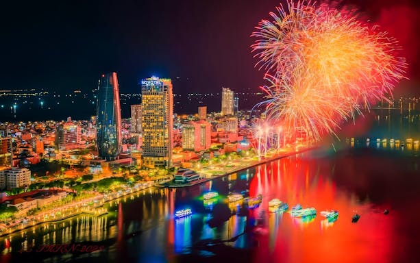 Da Nang skyline with fireworks over the river during the International Fireworks Festival.
