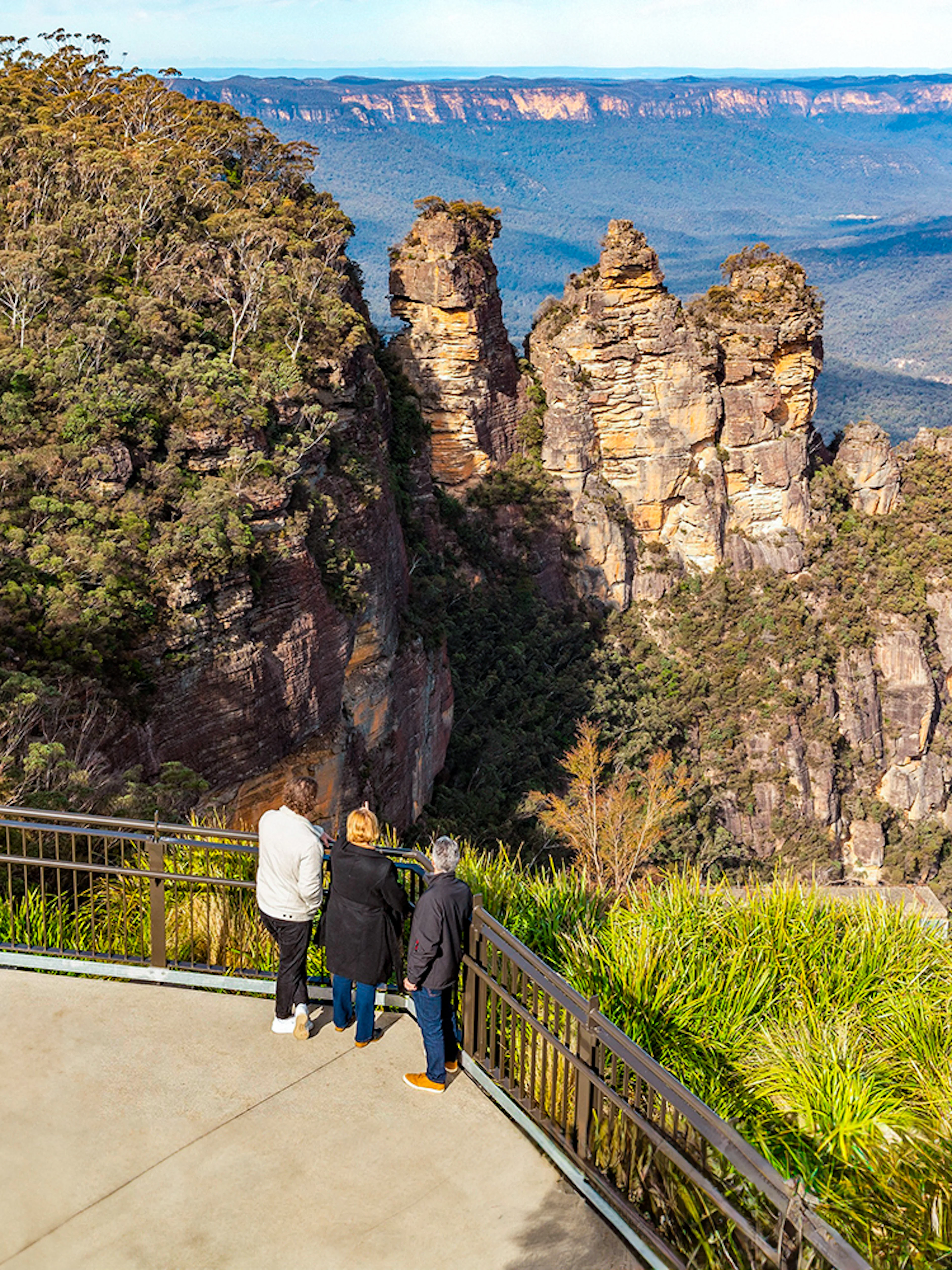 Visitors at Echo Point viewing the Three Sisters rock formation, Blue Mountains, Australia.